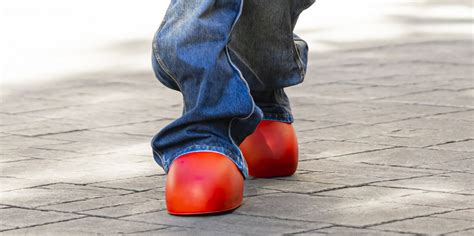 fake big red shoes|big red boots meaning.